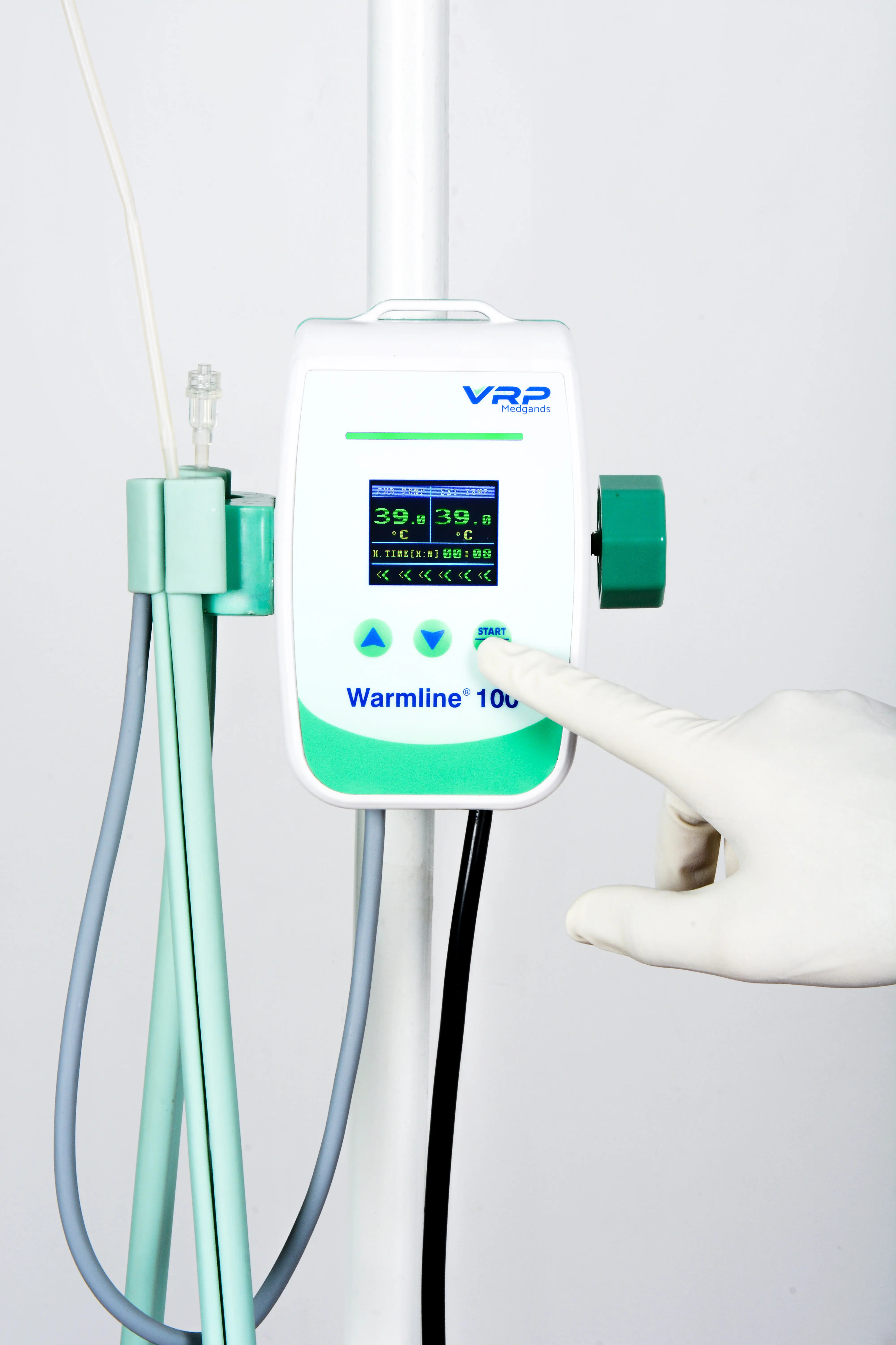 Blood and fluid warmer with real-time digital temperature display and safety alarms