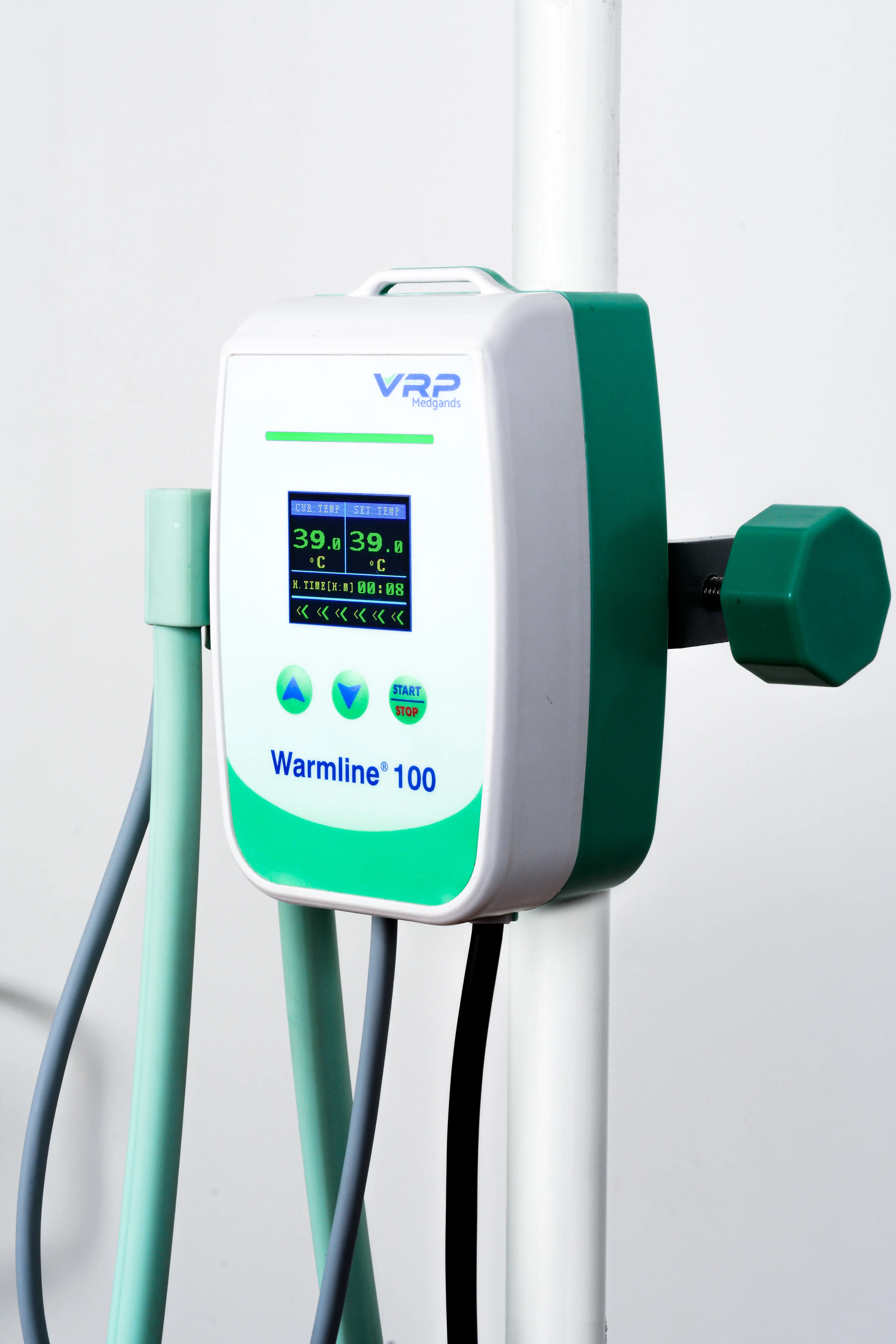 Compact blood and fluid warmer mounted on a standard hospital IV pole